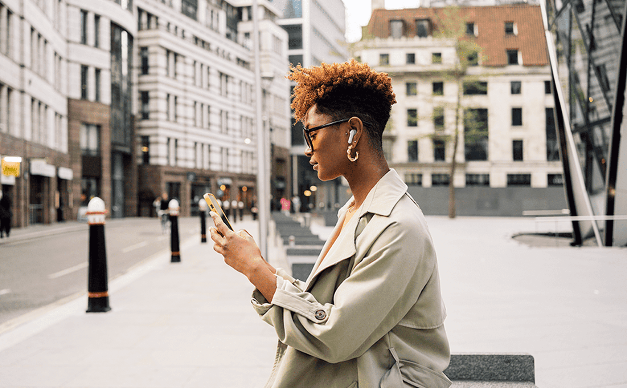 woman enjoying JBL Tune Beam Earbuds