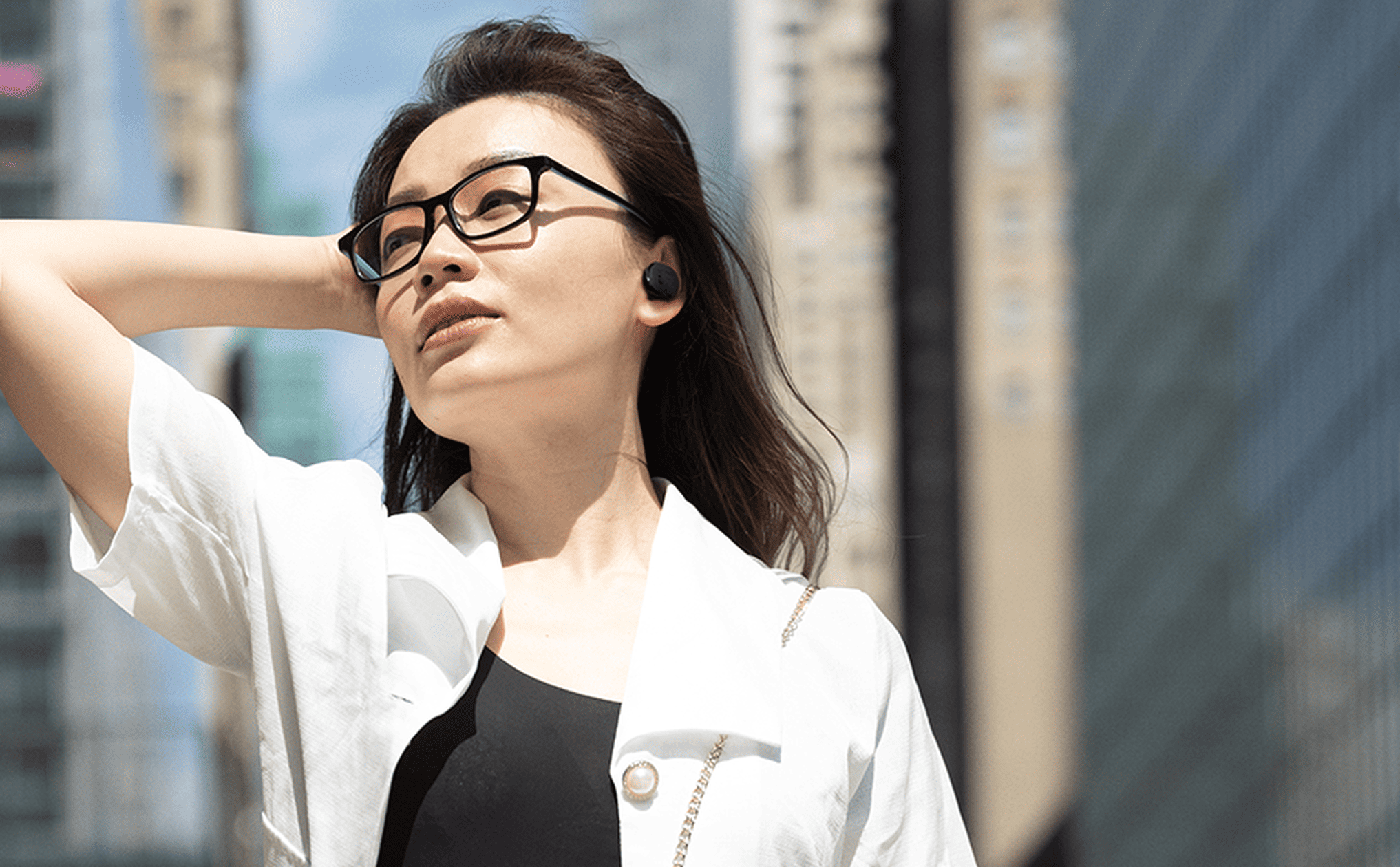 JBL Tune Buds on woman