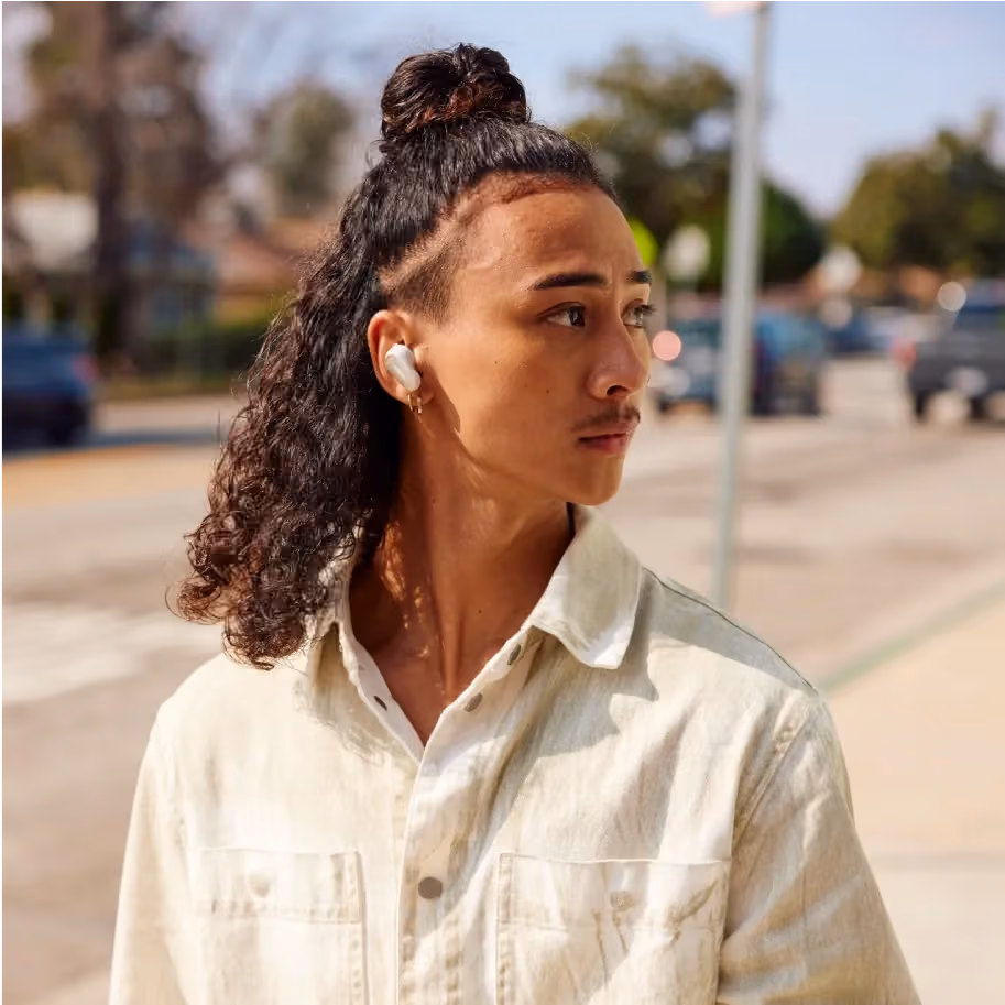 Man wearing Bose Ultra Earbuds